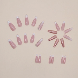 French gradient press-on nails in long coffin shape with glitter and rhinestones