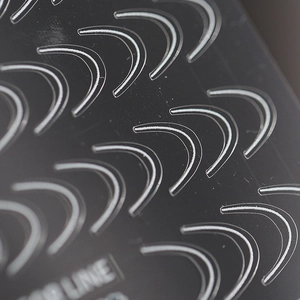 5D embossed white French gradient nail stickers with thin curved lines on black background