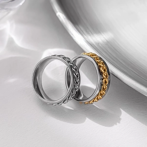Industrial style rotating stainless steel chain ring in silver and gold duo finishes