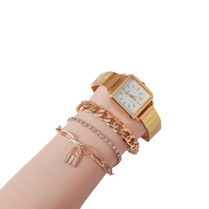 Chic 4pcs set including a gold square quartz watch and three matching luxury bracelets