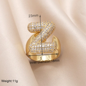 Detail view of gold letter Z ring with zircon pavé, showing 23mm height and 18mm diameter