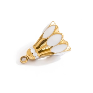 Macro shot of a golden and white badminton shuttlecock pendant with attachment loop