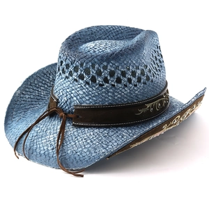 Detail of blue straw cowboy hat featuring breathable weave and rhinestone embroidery decoration