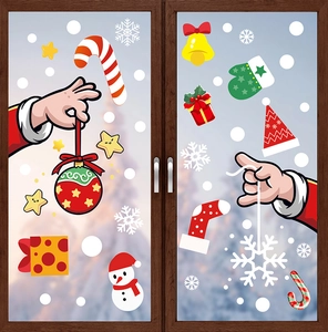 Détail de stickers de Noël électrostatiques avec bonhomme de neige et sucres d'orge colorés