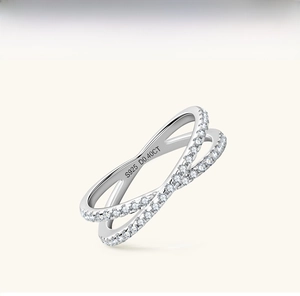 Close-up of S925 sterling silver X-shape ring with 0.40CT Moissanite hallmark