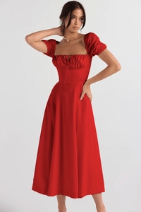 Detail view of red puff sleeve dress with floral print and square neckline design