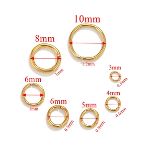Detail view of 18K gold-plated stainless steel jump rings in various diameters and gauges