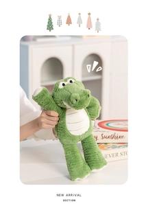 Detailed view of the soft green plush crocodile toy showing premium texture and rebound