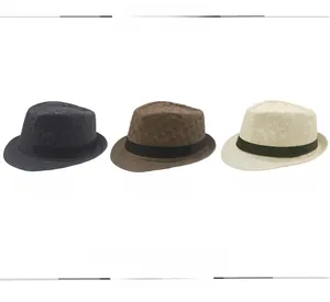 Close-up of woven straw jazz hats in black, brown and off-white with texture details