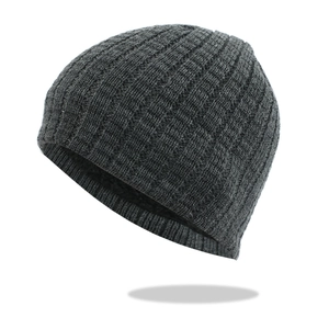 Detail of dark grey ribbed knit beanie showing soft thermal fleece lining for winter warmth
