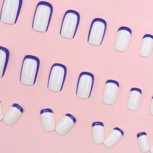 Short square press-on nails in white and royal blue French contrast color design