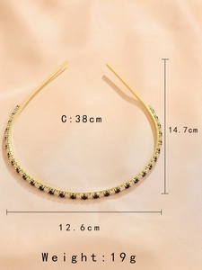 Detailed size specifications for the emerald green zircon headband with measurement labels