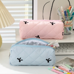 Quilted floral pencil case with cute rabbit embroidery in pink and blue pastel colors