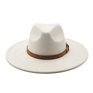 Detailed top view of a beige wide-brim fedora hat with a brown leather decorative band