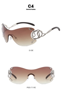 Detail of Y2K rimless sunglasses featuring silver snake temple with rhinestone accents