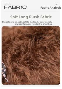 Close-up of soft brown plush fabric with floral trim detail on a puppy stuffed animal