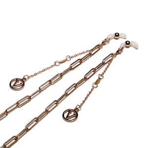Gold metal eyeglasses chain with V-letter charms and rectangular link strands on white background