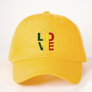 Classic yellow cotton baseball cap featuring colorful one LOVE Rasta print decoration