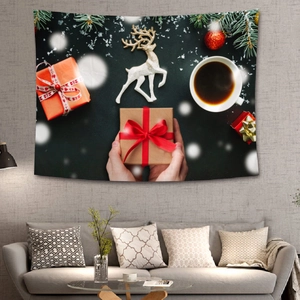 Christmas tapestry wall hanging featuring reindeer, coffee cup and red gift box