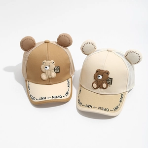Close-up of kids mesh baseball caps featuring cute 3D bear ears and cartoon teddy patches