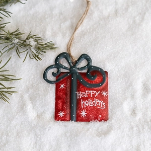 Vintage metal Christmas gift box hanging ornament with festive snow scene