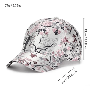 Embroidered baseball cap with pink cherry blossoms and birds on grey fabric