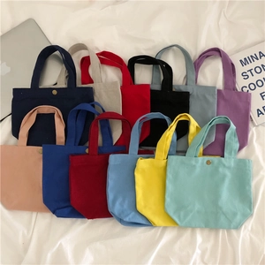 Solid color canvas lunch bags with snap buttons in twelve vibrant colors collection