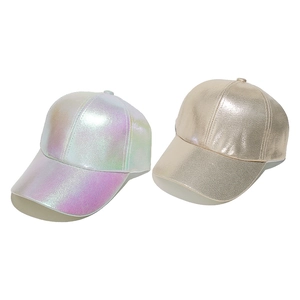 Detail of metallic PU leather baseball caps in iridescent purple and champagne gold colors