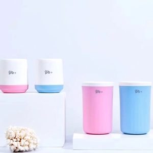 Pink and blue portable dog paw cleaner cups in two sizes for gentle pet paw cleaning