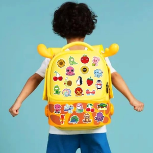 Variety of cute cartoon animal stickers displayed on a yellow giraffe toddler backpack
