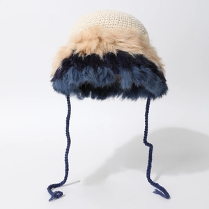 Maillard style winter knit hat with colorful faux fur trim and ties for women