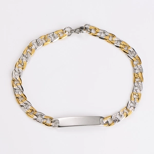 Detail view of two-tone gold and silver Cuban link chain with a polished rectangular ID plate