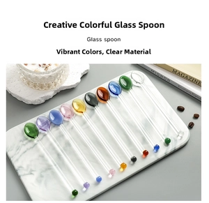Detailed view of colorful heat-resistant glass stirring spoons in various vibrant colors