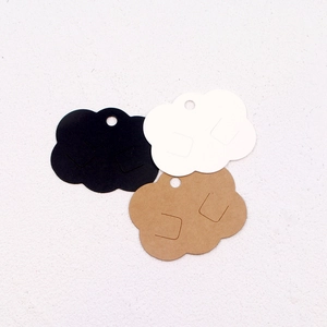 Cloud-shaped cardboard earring display cards in black, white, and kraft brown colors