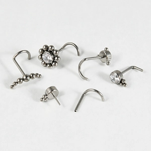 Detailed set of six G23 titanium nose studs with clear zircons and varied L-shape designs