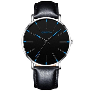 Detail of Geneva minimalist watch with black dial and blue pointers on silver case