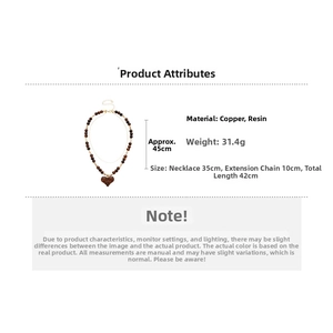 Detail of 18K gold plated double-layer necklace with tiger eye beads and heart pendant