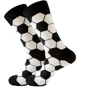 Detailed close-up showing the knit texture and soccer ball pattern of long crew socks