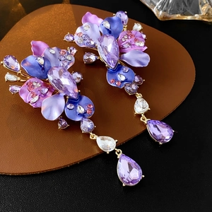 Vintage floral tassel earrings with purple crystals and gold-tone rhinestone accents