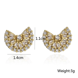 Macro shot showing 1.4cm by 1.1cm gold fan earrings with cubic zirconia inlay details