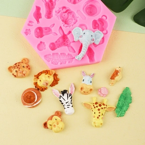 Pink safari animal silicone mold with lion, giraffe, and elephant for cake decoration