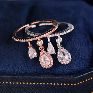 Elegant thin open rings with teardrop charms in rose gold and silver finish