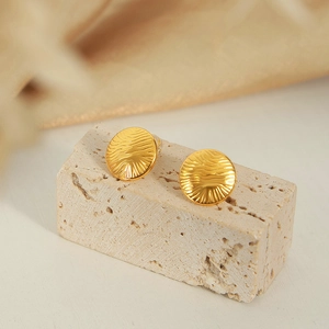 Elegant gold titanium steel earrings featuring a unique water ripple textured round design