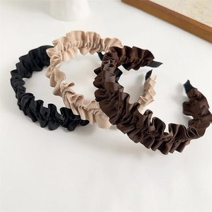 French pleated wave hairband set in black, beige, and dark brown ribbed fabric colors
