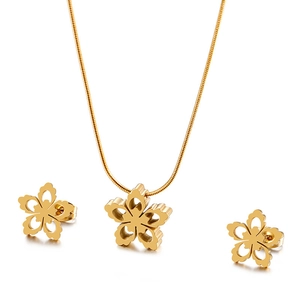 Minimalist hollow snowflake jewelry set with gold necklace and matching stud earrings