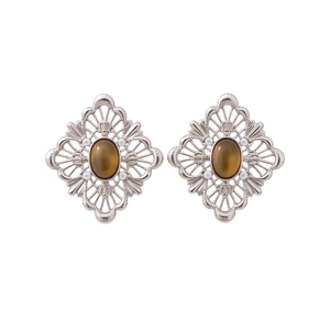 Vintage hollow rhombus tiger eye stone earrings with zircon accents on a white background