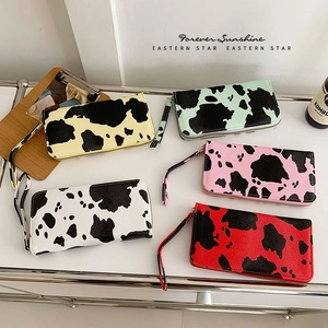 Fashionable cow print PU leather long wallets with wristlet straps in five vibrant colors