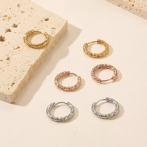 French vintage quilted C-shaped earrings in gold, rose gold and silver stainless steel