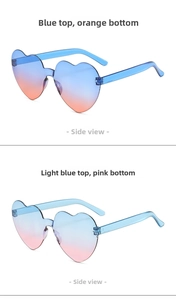 Detail view of heart-shaped rimless sunglasses in gradient blue, orange, and pink hues