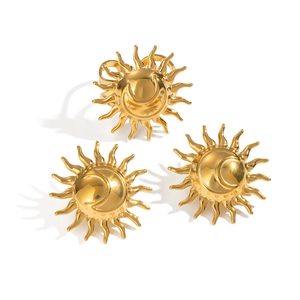 Three gold sun and moon stainless steel rings set arranged on a clean white background